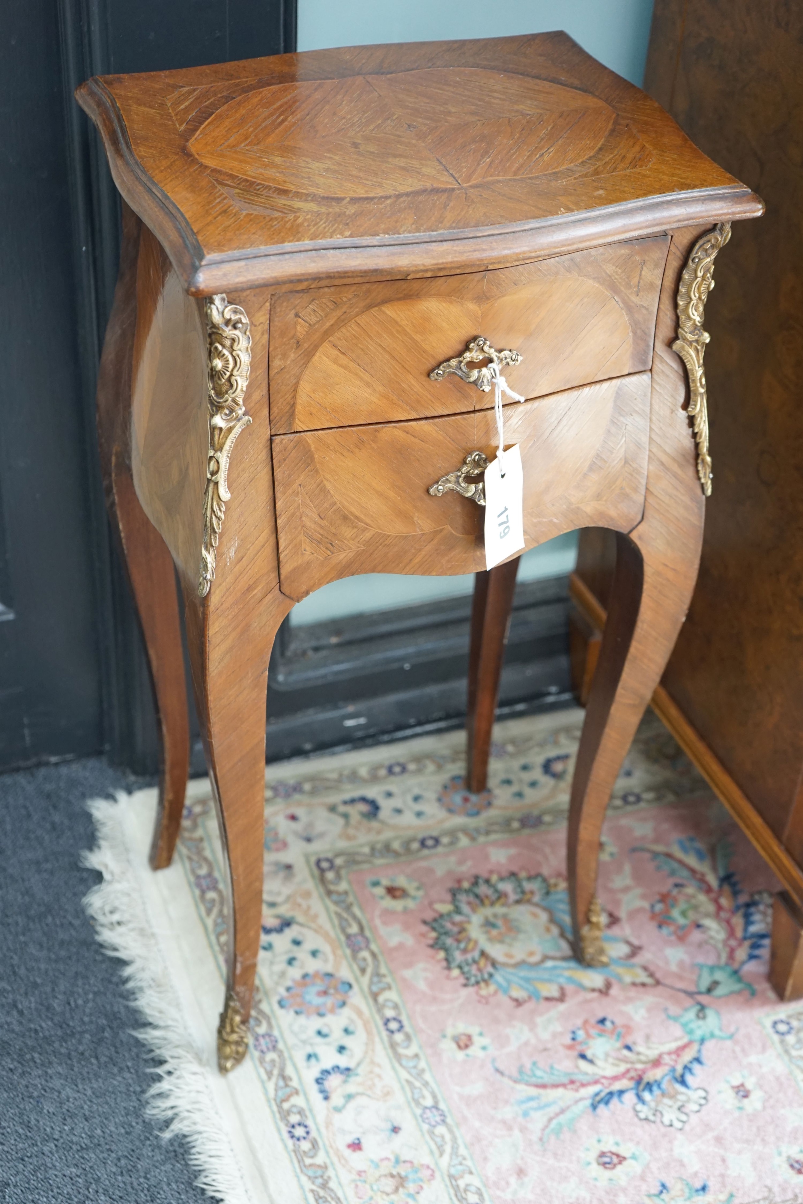 A pair of Louis XVI style serpentine kingwood two drawer bedside chests, width 34cm, depth 26cm, height 78cm